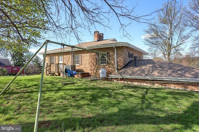 896 Hershey Heights Rd, Hanover, PA 17331 - back of property featuring brick siding, a chimney, and a lawn