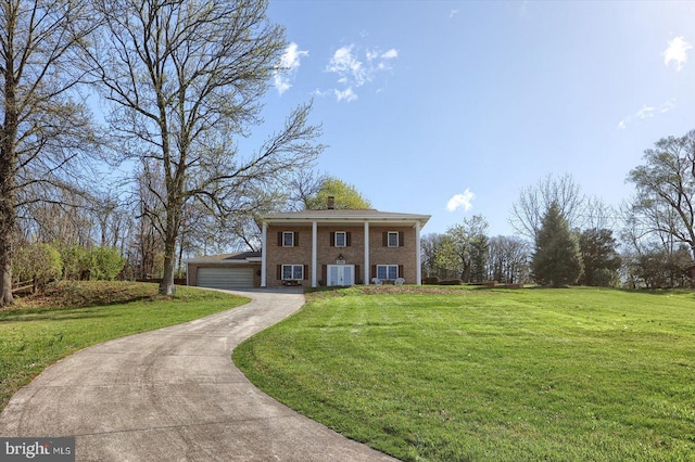 896 Hershey Heights Rd, Hanover, PA 17331 - greek revival inspired property featuring a front lawn, brick siding, and driveway