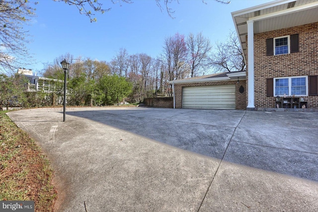 896 Hershey Heights Rd, Hanover, PA 17331 - view of home's exterior with brick siding, concrete driveway, and an attached garage