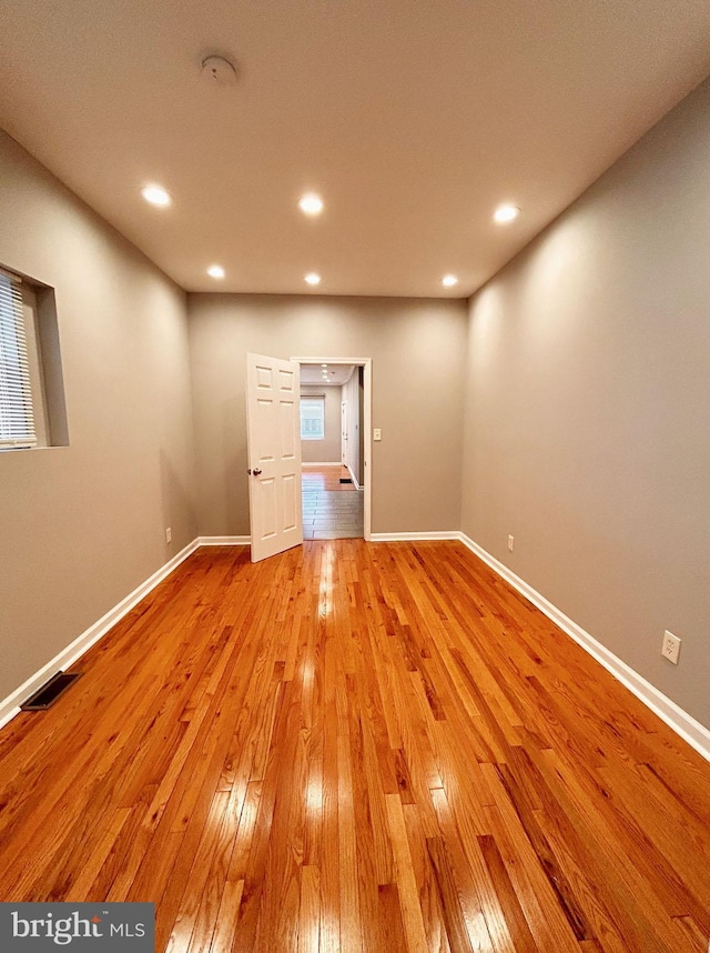 7053 Paschall Ave, Philadelphia, PA 19142 - empty room featuring light wood-style floors, recessed lighting, baseboards, and a smoke detector