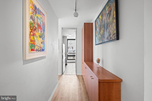210 Locust St Unit 19Gw, Philadelphia, PA 19106 - hallway featuring light wood finished floors and track lighting