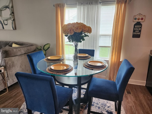 114 Furies St, Smyrna, DE 19977 - dining room featuring dark wood finished floors, plenty of natural light, and baseboards