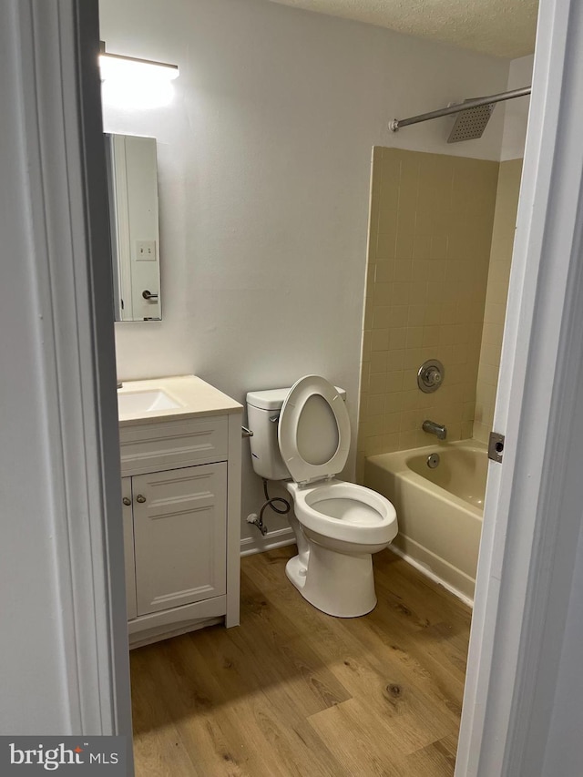 7539 Rain Flower Way, Columbia, MD 21046 - full bath with vanity, wood finished floors, and shower / bathtub combination