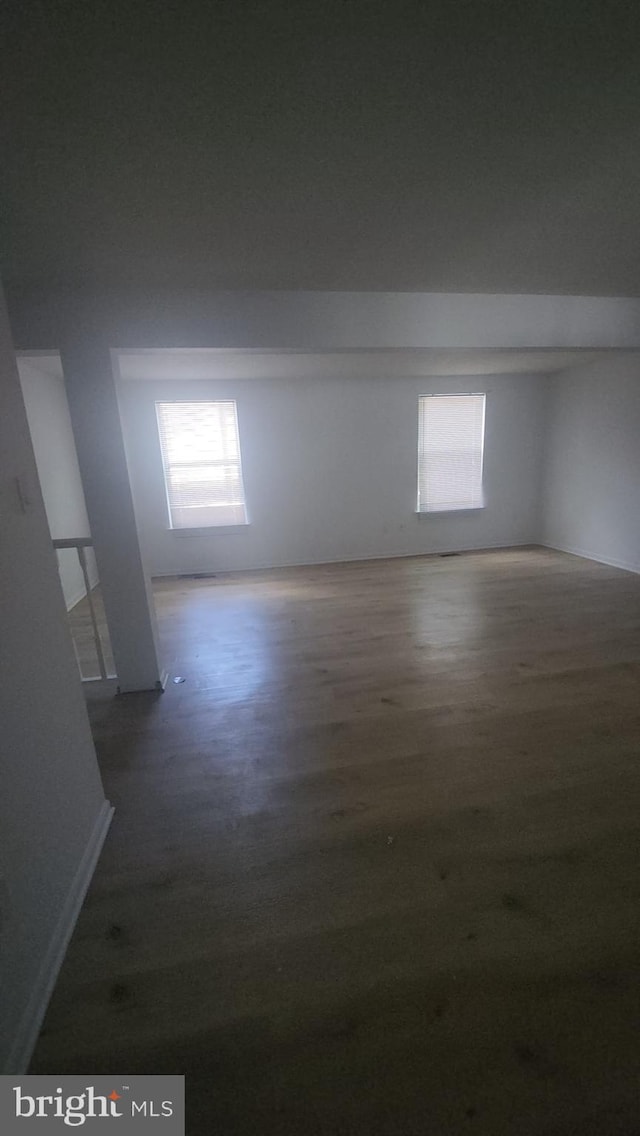 7539 Rain Flower Way, Columbia, MD 21046 - empty room with healthy amount of natural light and wood finished floors