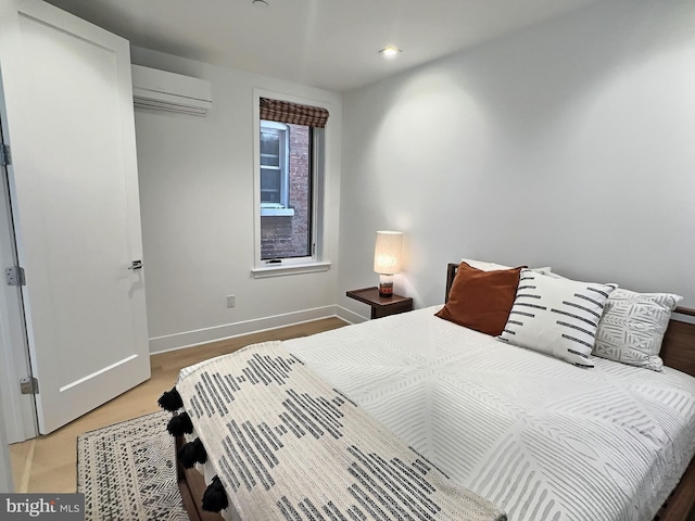 1753 Willard St NW Unit 3, Washington, DC 20009 - bedroom with a wall unit AC, baseboards, and recessed lighting