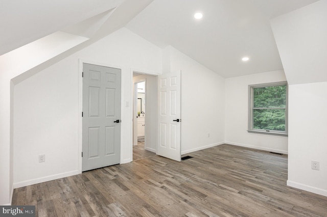 74 Piney Ridge Ln, North East, MD 21901 - additional living space with lofted ceiling, wood finished floors, baseboards, and recessed lighting