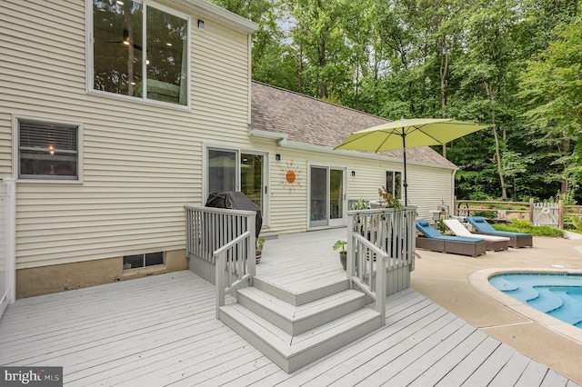74 Piney Ridge Ln, North East, MD 21901 - wooden terrace with an outdoor pool, a patio area, and view of scattered trees