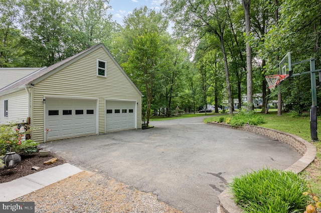 74 Piney Ridge Ln, North East, MD 21901 - garage featuring asphalt driveway
