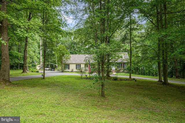 74 Piney Ridge Ln, North East, MD 21901 - obstructed view of property featuring a front yard and asphalt driveway