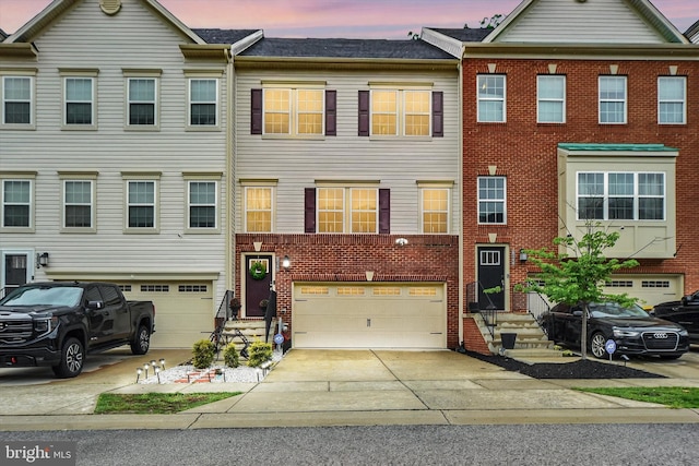 8346 Daydream Cres, Pasadena, MD 21122 - multi unit property featuring a garage, driveway, and brick siding