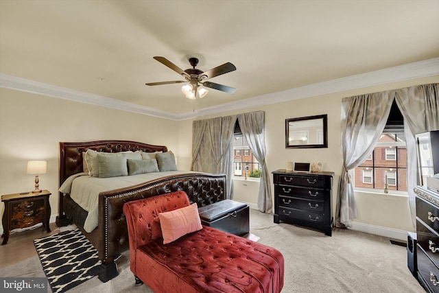 8346 Daydream Cres, Pasadena, MD 21122 - bedroom featuring crown molding, baseboards, carpet floors, and a ceiling fan
