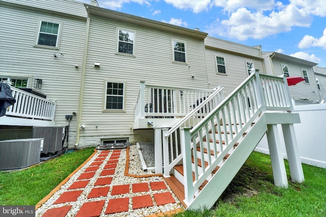 8346 Daydream Cres, Pasadena, MD 21122 - rear view of house with central air condition unit, a wooden deck, and stairway