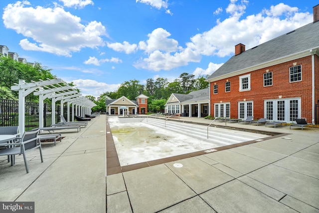 8346 Daydream Cres, Pasadena, MD 21122 - view of home's community with a pergola and a patio