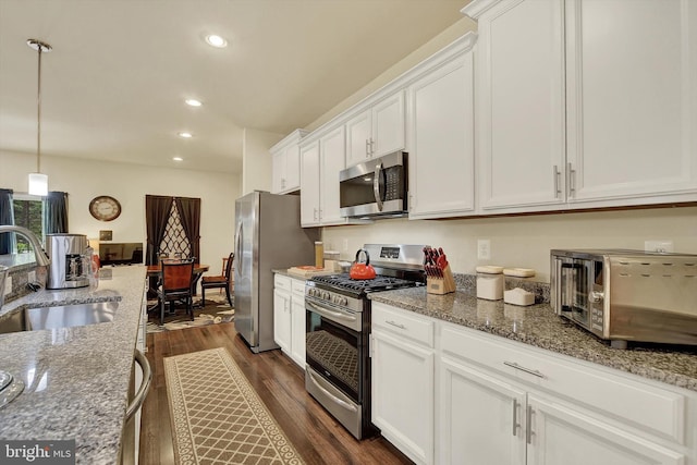 8346 Daydream Cres, Pasadena, MD 21122 - kitchen with appliances with stainless steel finishes, a sink, white cabinets, recessed lighting, and dark wood finished floors