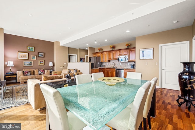 901 N Penn St Unit F2003, Philadelphia, PA 19123 - dining area featuring light wood-style floors and recessed lighting