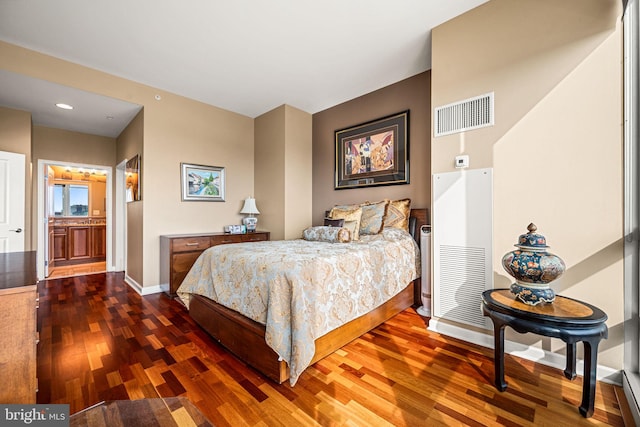 901 N Penn St Unit F2003, Philadelphia, PA 19123 - bedroom featuring wood finished floors, a heating unit, and baseboards
