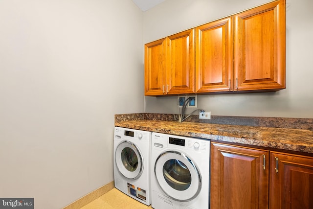 901 N Penn St Unit F2003, Philadelphia, PA 19123 - laundry room with cabinet space and washing machine and clothes dryer