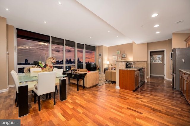 901 N Penn St Unit F2003, Philadelphia, PA 19123 - dining space featuring light wood-style floors, recessed lighting, and baseboards