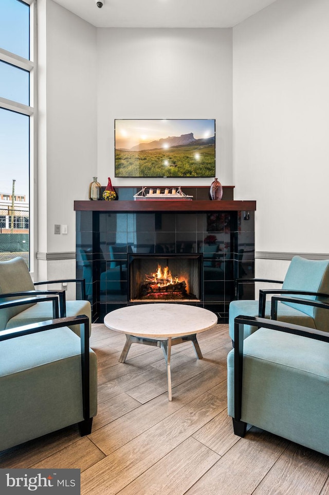 901 N Penn St Unit F2003, Philadelphia, PA 19123 - sitting room featuring a fireplace and wood finished floors