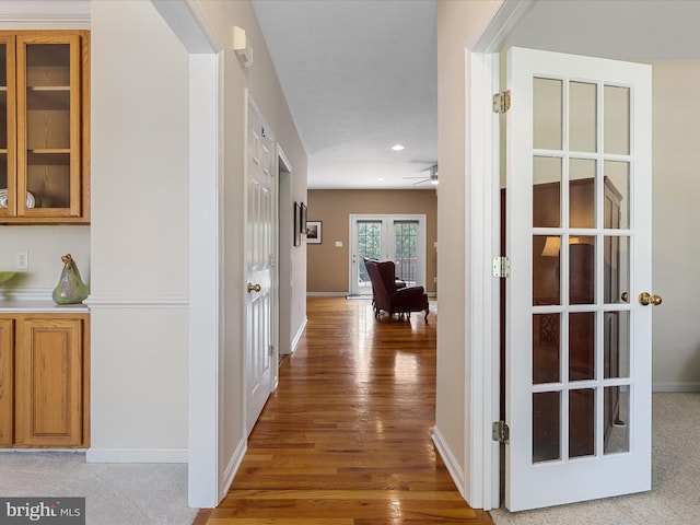 106 Barb Ct, Stephens City, VA 22655 - hallway featuring light wood finished floors, french doors, and recessed lighting