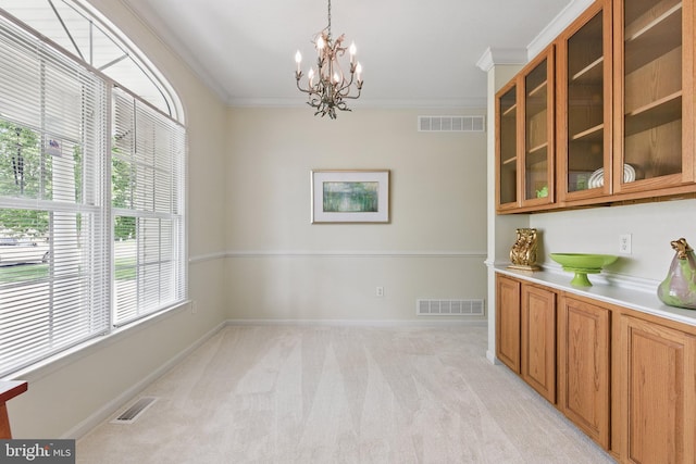 106 Barb Ct, Stephens City, VA 22655 - unfurnished dining area featuring a chandelier, light colored carpet, and crown molding