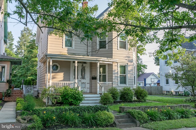 28 Bowen Ave, Woodstown, NJ 08098 - view of front of home featuring a porch and a chimney