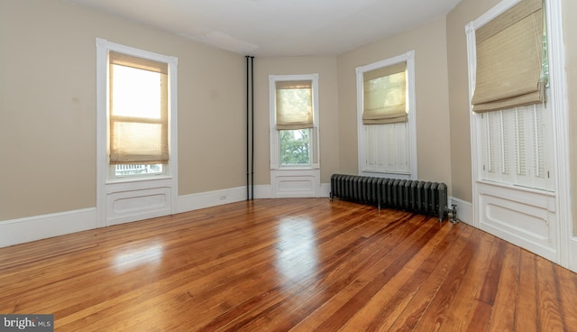 28 Bowen Ave, Woodstown, NJ 08098 - spare room featuring radiator and wood-type flooring