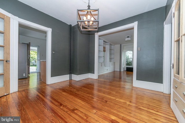 28 Bowen Ave, Woodstown, NJ 08098 - spare room with a chandelier, hardwood / wood-style flooring, healthy amount of natural light, and baseboards
