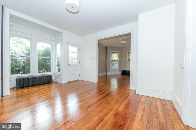 28 Bowen Ave, Woodstown, NJ 08098 - unfurnished room with radiator, light wood finished floors, and baseboards