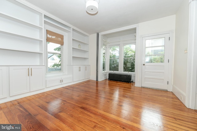 28 Bowen Ave, Woodstown, NJ 08098 - spare room featuring radiator, light wood finished floors, and built in features