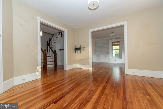 28 Bowen Ave, Woodstown, NJ 08098 - empty room featuring stairway, hardwood / wood-style flooring, and baseboards