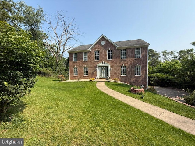 530 Glenhaven Dr, Glenshaw, PA 15116 - colonial home with a front lawn and brick siding