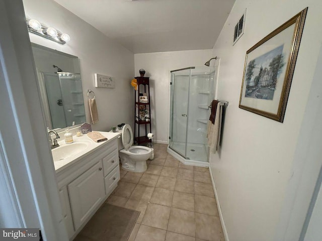 530 Glenhaven Dr, Glenshaw, PA 15116 - bathroom featuring toilet, vanity, a stall shower, and tile patterned floors