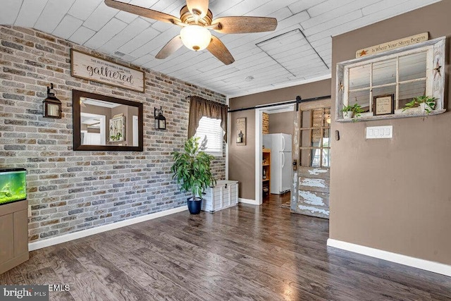 111 Lawrence Dr, Lanoka Harbor, NJ 08734 - spare room with a barn door, baseboards, wood ceiling, ceiling fan, and brick wall