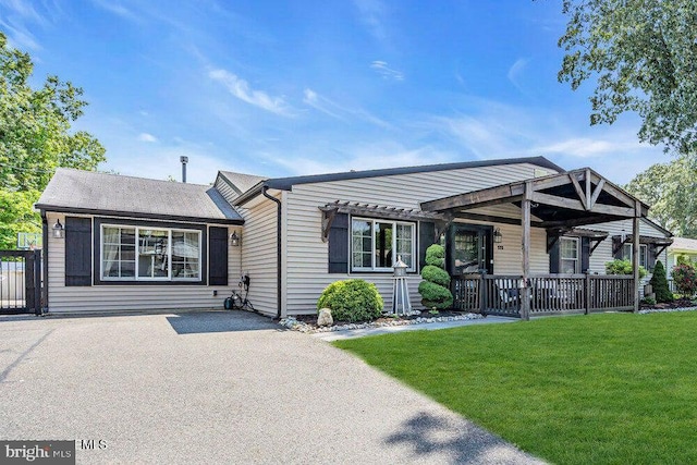 111 Lawrence Dr, Lanoka Harbor, NJ 08734 - view of front of house featuring covered porch and a front yard