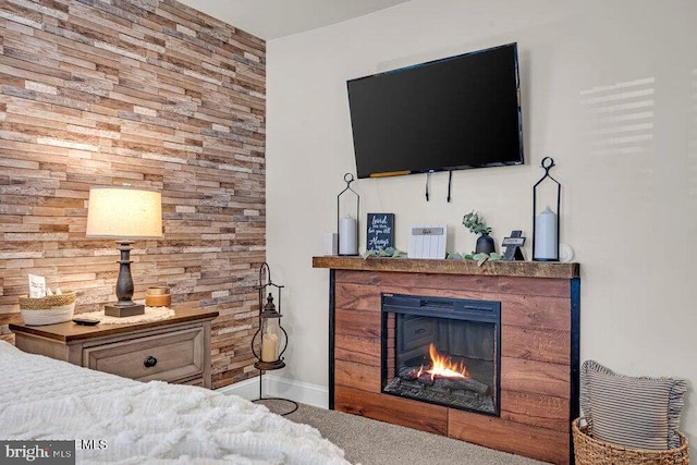 111 Lawrence Dr, Lanoka Harbor, NJ 08734 - bedroom featuring a warm lit fireplace and baseboards