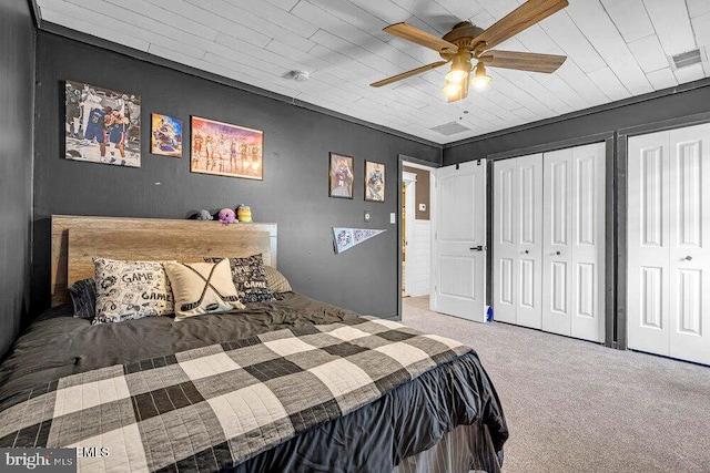 111 Lawrence Dr, Lanoka Harbor, NJ 08734 - carpeted bedroom featuring multiple closets and ceiling fan