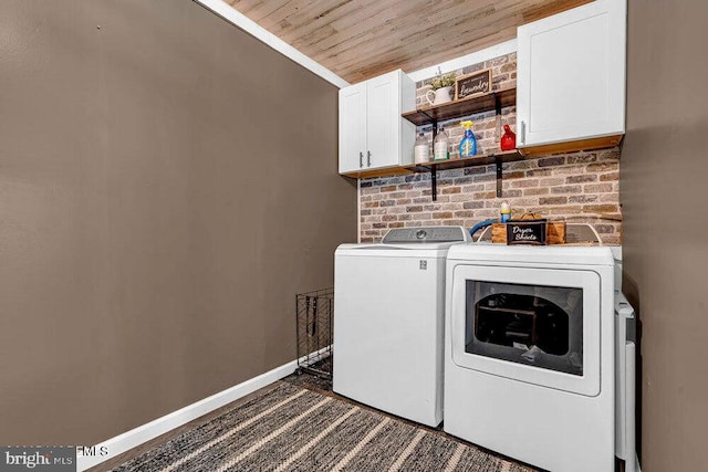 111 Lawrence Dr, Lanoka Harbor, NJ 08734 - laundry area featuring separate washer and dryer, cabinet space, wooden ceiling, baseboards, and dark colored carpet