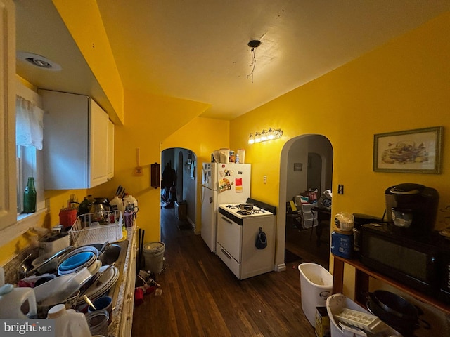818 Rte 481, Monongahela, PA 15063 - kitchen with white appliances, vaulted ceiling, arched walkways, dark wood-style floors, and white cabinetry