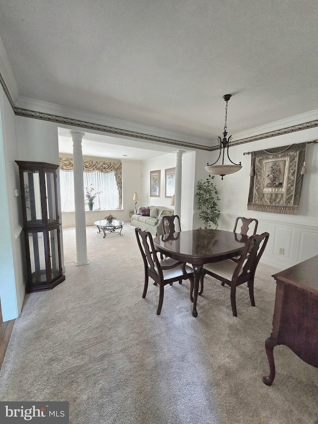 721 Kincaid Mills Ln, Wallingford, PA 19086 - dining room with decorative columns, crown molding, and carpet flooring
