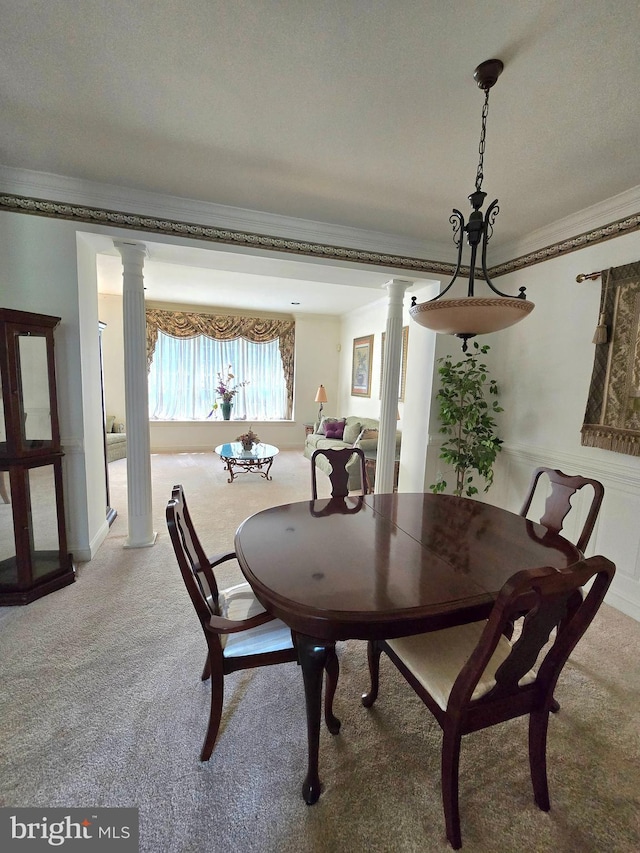 721 Kincaid Mills Ln, Wallingford, PA 19086 - carpeted dining space with ornate columns and crown molding