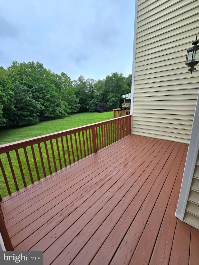 721 Kincaid Mills Ln, Wallingford, PA 19086 - wooden deck featuring a lawn
