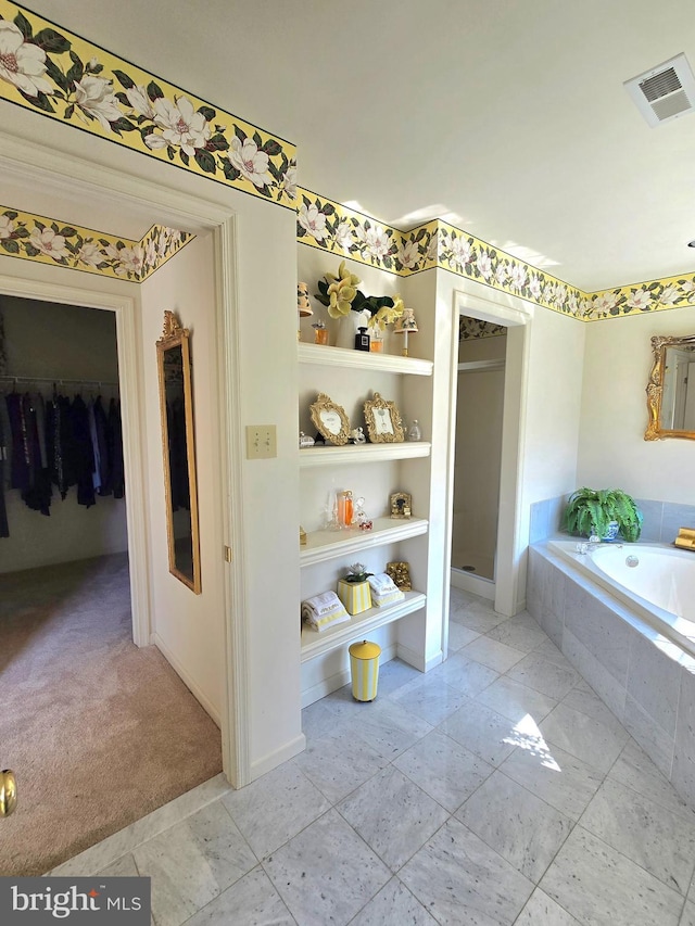721 Kincaid Mills Ln, Wallingford, PA 19086 - full bath with a garden tub, a stall shower, and a walk in closet