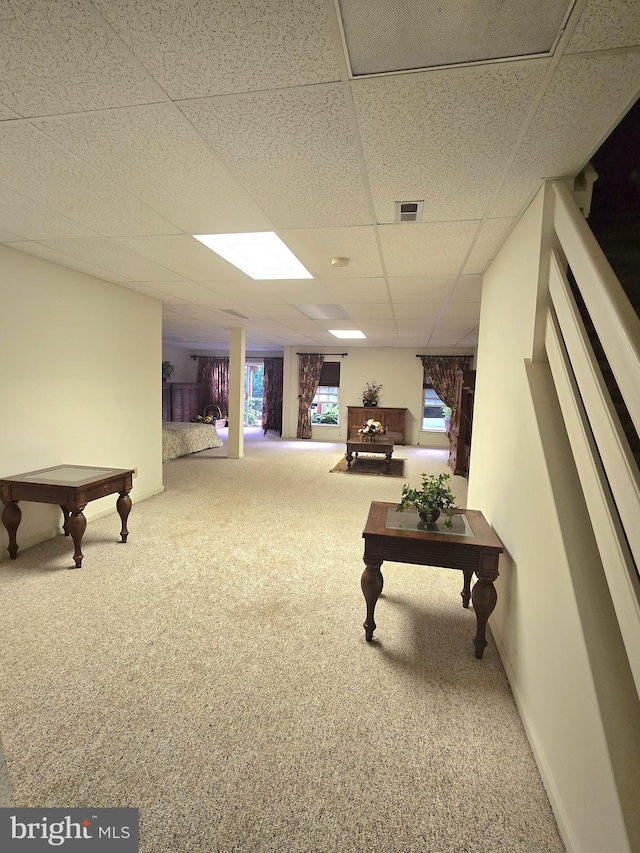 721 Kincaid Mills Ln, Wallingford, PA 19086 - carpeted living area featuring a paneled ceiling