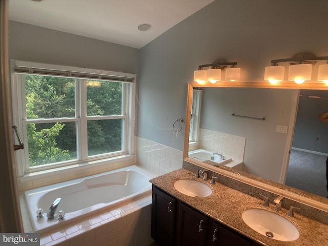 8726 Wadebrook Ter, Springfield, VA 22153 - bathroom with a bath and double vanity