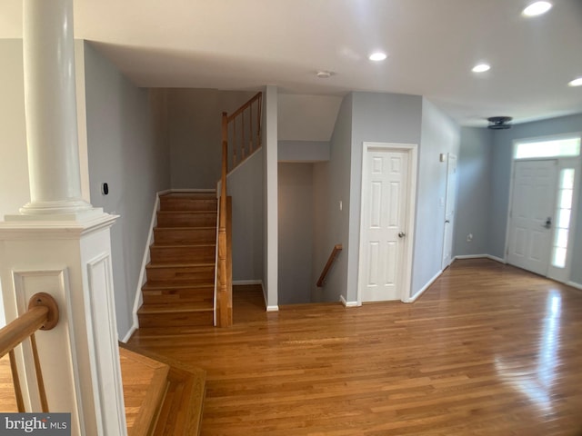 8726 Wadebrook Ter, Springfield, VA 22153 - foyer featuring wood finished floors, recessed lighting, baseboards, and decorative columns
