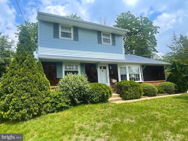 604 Ivystone Ln, Cinnaminson, NJ 08077 - traditional-style house with a front lawn