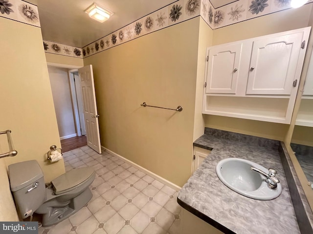 604 Ivystone Ln, Cinnaminson, NJ 08077 - bathroom with toilet, vanity, tile patterned floors, and baseboards