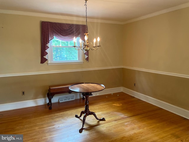 604 Ivystone Ln, Cinnaminson, NJ 08077 - unfurnished dining area featuring a chandelier, wood finished floors, ornamental molding, and baseboards