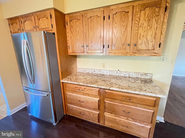 604 Ivystone Ln, Cinnaminson, NJ 08077 - kitchen featuring freestanding refrigerator, dark wood finished floors, light stone counters, and baseboards